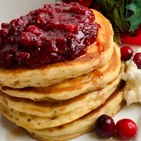 Eggnog Pancakes with Cranberry Syrup